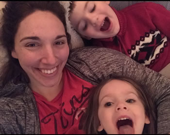 Kellie Stecher taking selfie with her two kids
