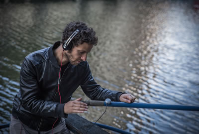 Bruno Zamborlin using vibration device to make music with oar