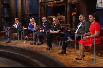 Canada's Dragon's Den Cast all sitting on stage