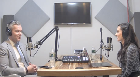 Ryan and Hala Taha on a live podcast in the studio