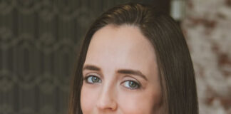 Headshot photo of Suzanne Huber Feature on Coruzant