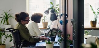 High-Functioning Disabilities at Work: A Roadmap for Success disabilities at work shown with a worker in a wheelchair