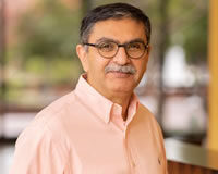 Ash Munshi Headshot photo of Ash Munshi