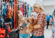 Going to The Dogs? Sikka Analytics Show Huge Pet Buying During COVID A mom and daughter at a store with their pet buying supplies