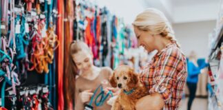 Going to The Dogs? Sikka Analytics Show Huge Pet Buying During COVID A mom and daughter at a store with their pet buying supplies