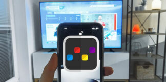 The Future of Digital Marketing: Solve COVID Contactless Society man holding cellphone up to tv for scanit technology