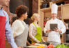 Consumer-centric Design Innovates the Future of Smart Tech 4 chefs in kitchen monitoring their culinary with technology