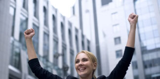 Are You Serious? A Breakthrough to Unexpected Perspective woman in business suit celebrating a breakthrough to unexpected perspective