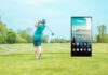 How Technology is Changing the Way We Play Golf golfer swing on a golf course with a smart phone showing a smart app