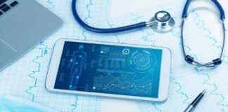 Technology That Is Making Health Care Better smart phone with health radiology app showing next to ekg and stethascope