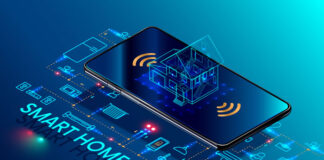 What Will Smart Homes Look Like in 10 Years? hologram of smart home sitting on mobile phone representing iot