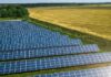 The Benefits of a Ground-Mounted Solar Energy Farm hundreds of ground solar panels in a large field