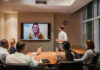 Genuine Presence Assurance: Ensuring Secure Video Conferencing business meeting in conference room on a video conference call