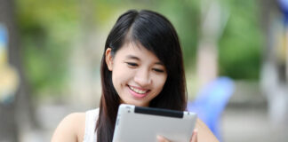 2021 Predictions: A Growing Need for Connected Wireless Technologies smiling girl with connected wireless technologies