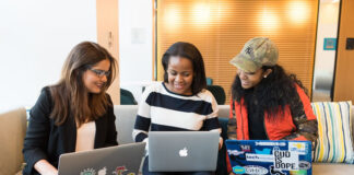 Tech, Diversity, Inclusion: The Essentials for Effective Collaboration three girls in tech, diversity and inclusion with their laptops building effective collaboration