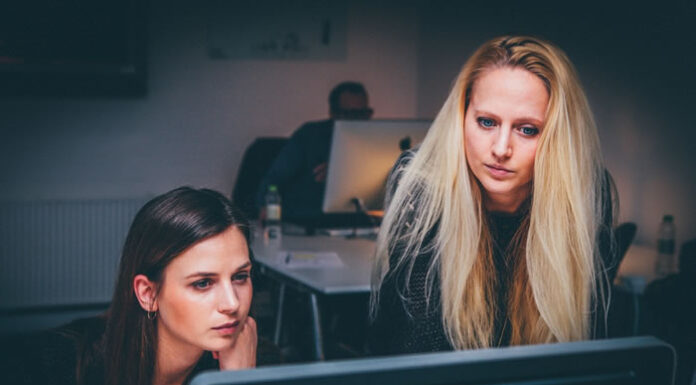 Staff Augmentation Companies: The Best Option to Improve Your Team women working in staff augmentation together on a pc