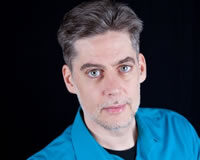 Ari Vidali Headshot of Ari Vidali