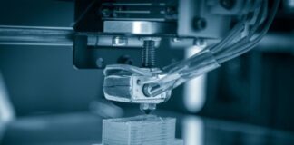 Ways That 3D Printing Helps Us Explore Space 3D printer in action printing a piece of space material