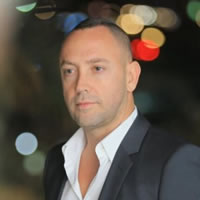 Headshot of CEO Meyr Aviv