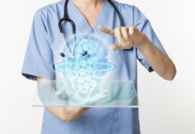 doctor using transparent tablet with hologram digital health technology