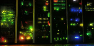 How to Build a Responsive and Iterative Infrastructure darkened data center showing server infrastructure with many led lights