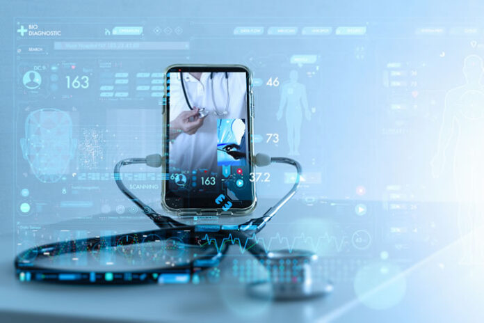 mobile phone with healthcare provider on screen with a stethoscope connected to the phone