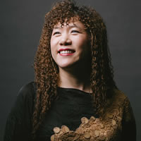 Headshot of Co-Founder and Chairwoman Weili Dai