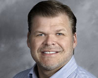 Headshot of Founder and CEO Michael Pink