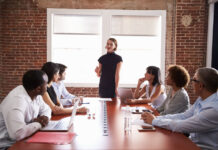 Turning Passion into a Sustainable and Fulfilling Career woman speaking in meeting about passion and goals