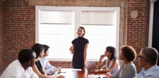Turning Passion into a Sustainable and Fulfilling Career woman speaking in meeting about passion and goals