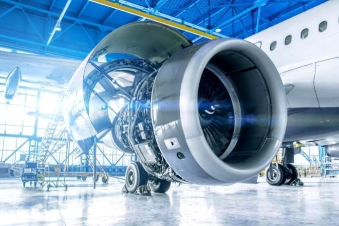 commercial jet in hanger displaying engine in aerospace industry