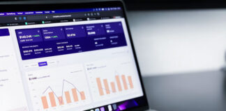 Leveraging Unbiased Information to Inform Business Tech Decisions laptop displaying unbiased information or analytics for businesses informing business tech decisions