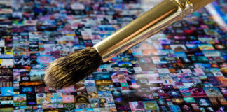 The Impact and Rise of Non-Fungible Tokens (NFTs) in The Art World traditional paintbrush going over digital art on a tablet representing NFT art