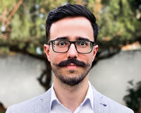 Zac Almeida Headshot of CEO and Senior CEO Consultant Zac Almeida