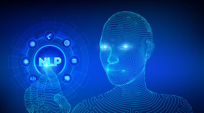 The Road Ahead for Speech Recognition Technology virtual AI robot pushing a virtual NLP button