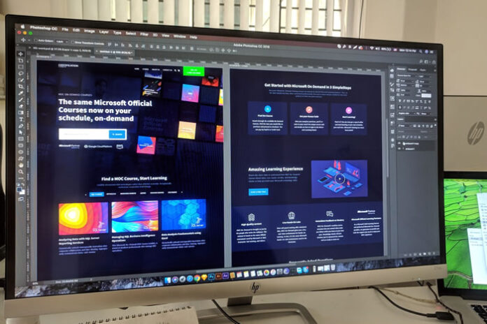 PC monitor displaying a web design layout