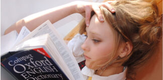 Top Organizations Staying Resilient with Continual Learning girl intently reading a book in her quest for continual learning