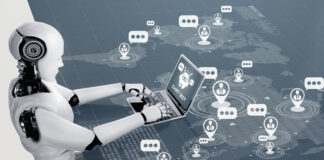 Why Gaining the AI Edge Is Critical in ECommerce AI robot sitting at virtual desktop and why gaining the AI edge is critical in ecommerce