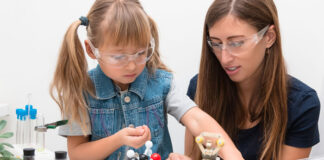 woman and girl working and learning STEM career