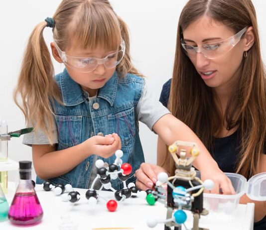 woman and girl working and learning STEM career