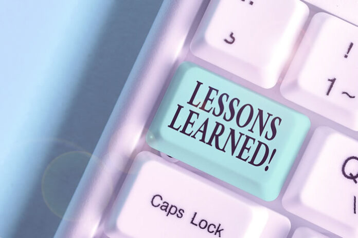 picture of a pink keyboard with a button called Lessons Learned