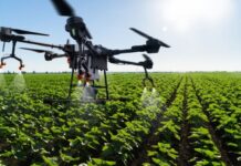 technology drone flying over agriculture