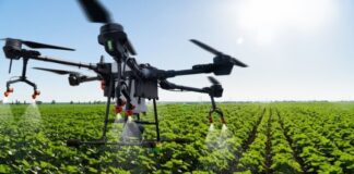 technology drone flying over agriculture