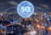 How 5G Will Revolutionize Healthcare for Everyone digital globe representing 5G floating over a city