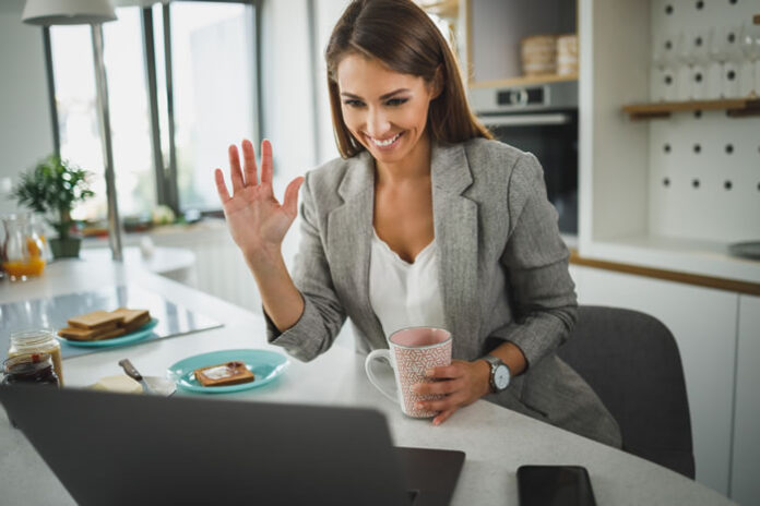 woman employee waving goodbye on laptop resignation