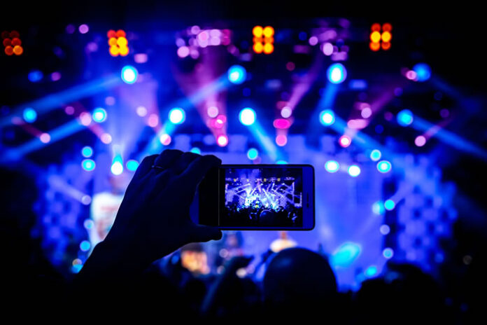 phone filming a physical event versus virtual events