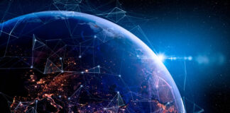 How this Tech Company is Helping Businesses and Changing the World view of a digital earth from space showing technology helping the world