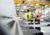 How To Increase Production at a Metal Manufacturing Plant two men working at a metal manufacturing plant