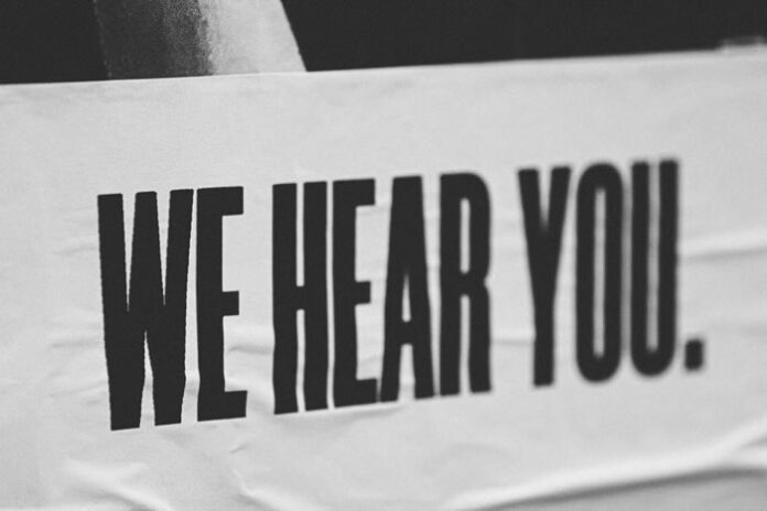 sign that says we hear you - the customer experience