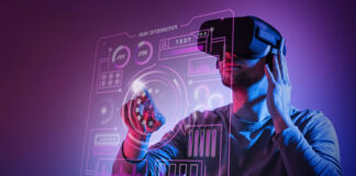 Is Your Organization Getting Ready for the Metaverse? man with VR headset using a digital dashboard in the metaverse